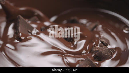 chocolate chunks in melted dark chocolate Stock Photo