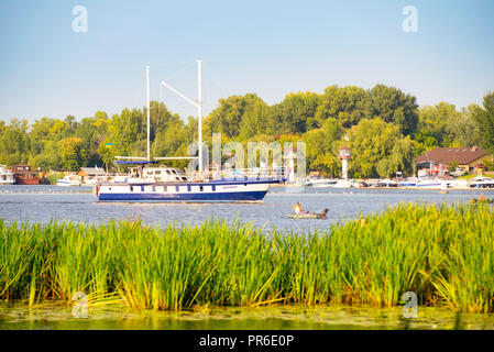 Kiev / Ukraine - August 31, 2018 - The 'Danapr' boat, navigating on the Dnieper river is ariving at the Obolon Yacht Club of Kiev, Ukraine, during a c Stock Photo