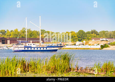 Kiev / Ukraine - August 31, 2018 - The 'Danapr' boat, navigating on the Dnieper river is ariving at the Obolon Yacht Club of Kiev, Ukraine, during a c Stock Photo