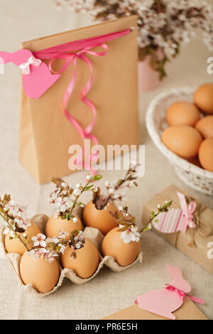 Happy easter. Easter decoration - flowering branches in the shell from the eggs. Selective focus. Stock Photo