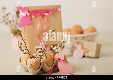 Happy easter. Easter decoration - flowering branches in the shell from the eggs. Selective focus. Stock Photo