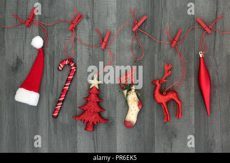 Christmas Decorations With Wooden Pegs On A Line Stock Photo