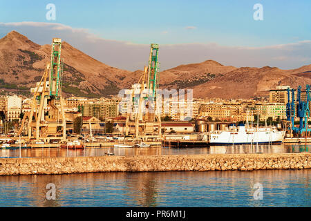 Sunrise at the Mediterranian sea and port, Palermo old city, Sicily, Italy Stock Photo