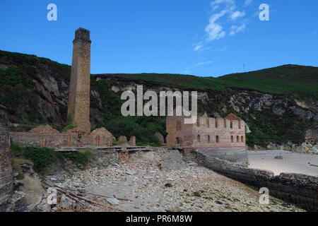 The Old Abandoned Porth Wen Brickworks on Isle of Anglesey Coastal Path in Wales, UK. Stock Photo