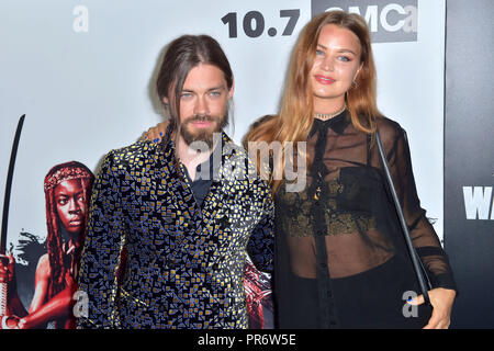 Tom Payne and Jennifer Akerman attending the AMC's 'The Walking Dead' Season 9 premiere at DGA Theater on September 27, 2018 in Los Angeles, California. Stock Photo