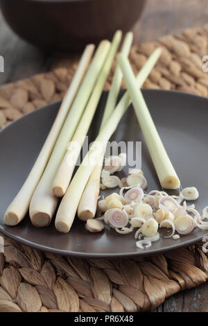 Stems of lemon grass on a plate Stock Photo