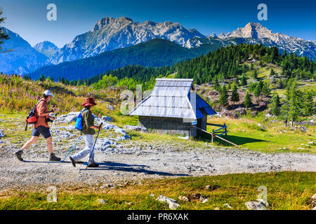 Mountains in summer, tourists and huts. Stock Photo