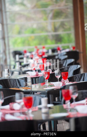 table setting at modern tropical restaurant Stock Photo
