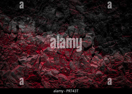 black and red colored rocks / rock wall background - Stock Photo