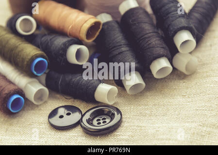 the composition of the seamstress, tailor, sewing thread and for knitting for the text substrate Stock Photo