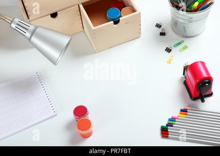 Frame with school accessories on the desk Stock Photo