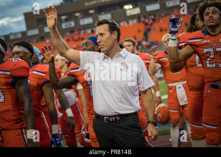 Huntsville, Texas, USA. 29th Sep, 2018. Sam Houston State Bearkats head coach K.C. Keeler celebrates with his team following Sam Houston State's thrilling 34-31 win in the NCAA football game against the Central Arkansas Bears at Bowers Stadium in Huntsville, Texas. Prentice C. James/CSM/Alamy Live News Stock Photo