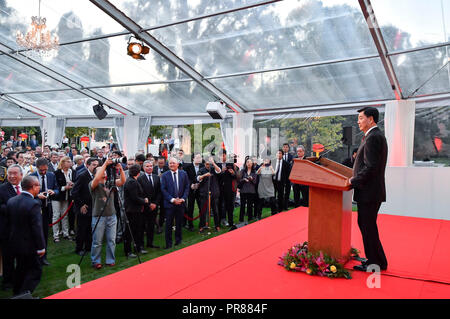 Paris, France. 27th Sep, 2018. Chinese Ambassador to France Zhai Jun (R) delivers a speech at the reception in celebration of the 69th anniversary of the founding of the People's Republic of China in Paris, France, on Sept. 27, 2018. Credit: Chen Yichen/Xinhua/Alamy Live News Stock Photo