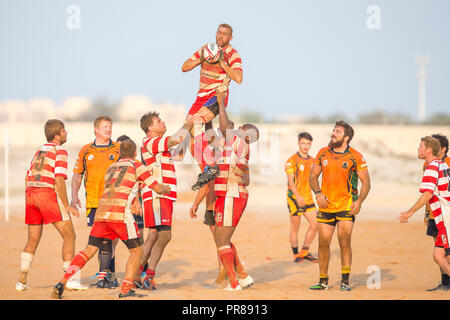 December 16, 2016 - Ras Al Khaimah, Ras Al Khaimah, United Arab Emirates - Team players seen in action at their sand pitch during the game.Rugby in RAK has been reported to have been played in the region since 1969 in various forms, the senior men's team is currently playing in the Community League in the UAE and also it has a youth team as well as a woman's sevens team. The remarkable thing about the RAK Rugby Club is that their home ground is a sand pitch located at Bin Majid Resort in Ras Al Khaimah, their seasons run from September to April every year and it's governed by the UAE Rugb Stock Photo