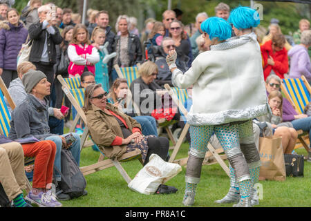Bournemouth, UK. 30th September 2018. The Arts by the Sea Festival is underway with all manner of colourful street performances, art, dance and music in the centre of Bournemouth. Crowds enjoy Bab’s and Stella’s Intergalactic Spectacular. Credit: Thomas Faull/Alamy Live News Stock Photo