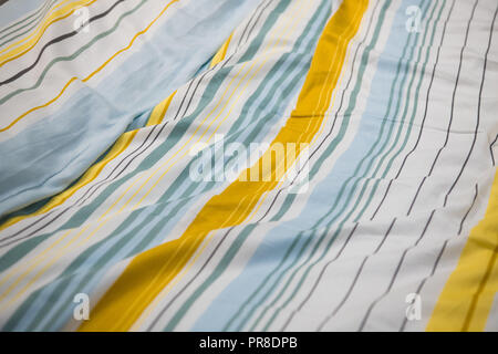 Gray and brown stripes. Striped brown and grey textile pattern as a background. Close up on vertical stripes material texture fabric. Linen cloth Stock Photo