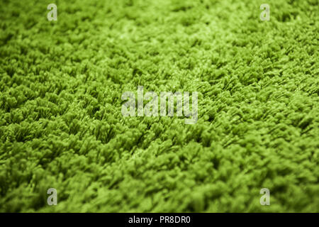 Close up of green yarn carpet for background Stock Photo