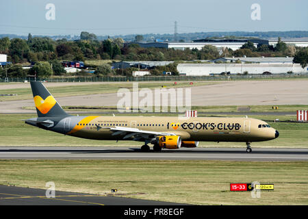 Thomas Cook Airbus A321 landing at Birmingham Airport, UK (G-TCDV) Stock Photo