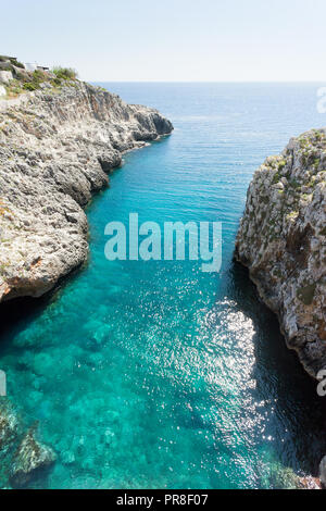 Apulia, Leuca, Italy, Grotto of Ciolo - Refelcting sunlight on the water surface Stock Photo