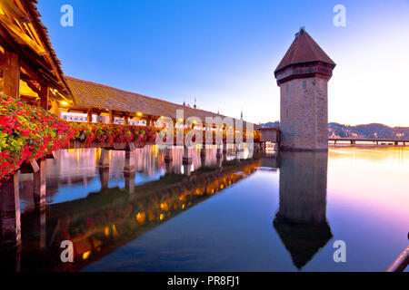 Luzern wooden Chapel Bridge and tower dawn view, town in central Switzerland Stock Photo