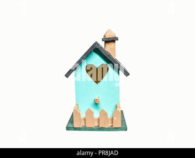 Cute little bird house isolated in white background in blue green color and heart shape window for Valentains day Stock Photo