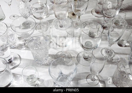 Variety of empty drinking glasses Stock Photo