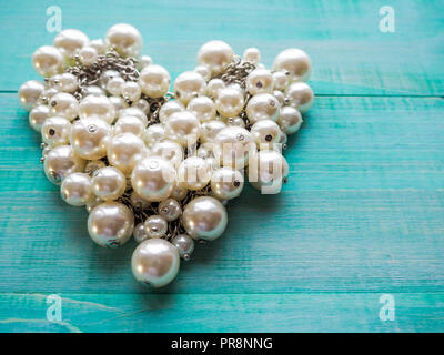 the heart is lined with pearls. love concept Stock Photo