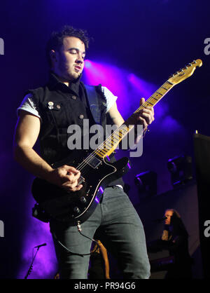 Kevin Jonas with The Jonas Brothers performs at the Cruzan Amphitheatre in West Palm Beach, Florida on August 2, 2013. Stock Photo