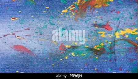 Denim, jeans texture background. Abstract oil paint texture on canvas. Drops of colorful paint on blue background denim, jeans Stock Photo