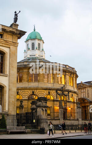 The Sheldonian Theater is Oxford's first Classical building by Christopher Wren, beside the neo-classical Clarendon Building. Stock Photo