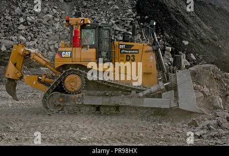 Caterpillar D9T Bulldozer Working at Tower Colliery open cast mine in South Wales Stock Photo