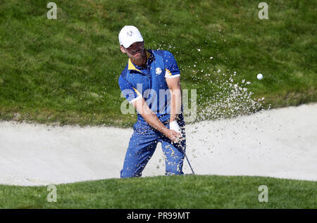 Team Europe's Paul Casey chips out of a bunker during the Singles match on day three of the Ryder Cup at Le Golf National, Saint-Quentin-en-Yvelines, Paris. Stock Photo
