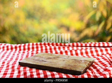 Empty table with empty cutting board for product display montages Stock Photo