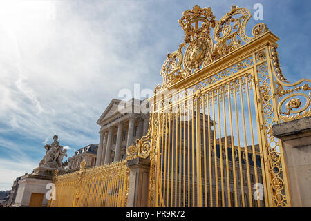 Perspective view of Main golden door and exterior fence at facade of Versailles Palace, Paris, France Stock Photo