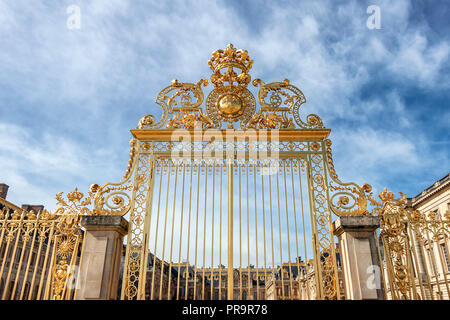 Main golden door in exterior facade of Versailles Palace, Paris, France Stock Photo