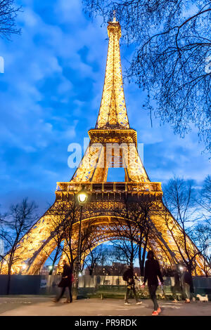 Paris, France - March 13, 2018: View of Eiffel tower illuminated at night Stock Photo