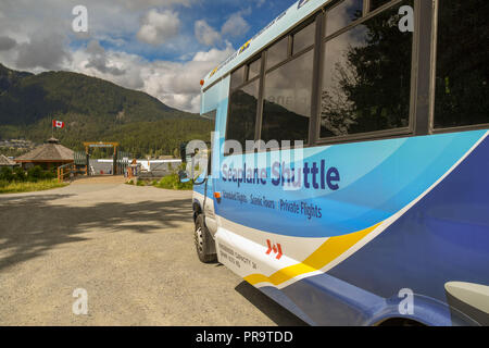 WHISTLER, BC, CANADA - JUNE 2018: Courtesy shuttle bus parked near the seaplane terminal in Whistler. Stock Photo