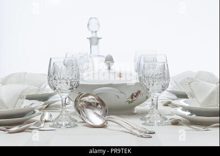 Fine dinning floral pattern white china dinner set arranged on a