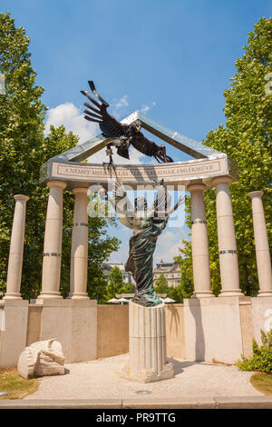 Budapest, Hungary - June 4,2017: A controversial German occupation memorial by hungarian  sculptor Peter Parkanyi Raab on Szabadsag square. Stock Photo