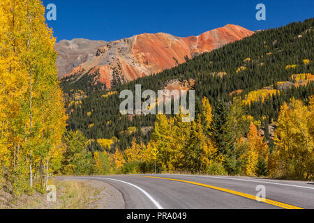 Golden aspens on Red Mountain Pass on the Million Dollar Highway in the Uncompahgre National Forest, Colorado. Stock Photo