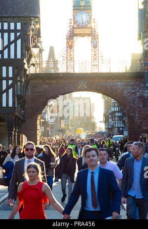 Eastgate st, and the Eastgate Clock, Chester on Race day, with thousands of race goers spilling into the City Centre. Taken in September 2018. Stock Photo