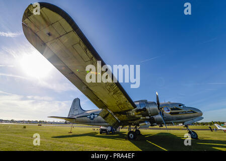 Douglas C-54 Skymaster transport plane at North Weald airfield, Essex, UK, under restoration with plans to fly by Save the Skymaster team Stock Photo