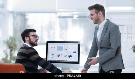 two businessmen analyzing stats financial data Stock Photo