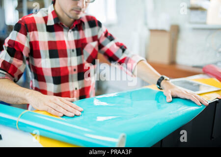 Checking glossy paper in typography Stock Photo