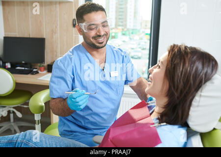 Middle-Eastern Dentist Working Stock Photo