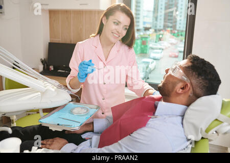 Female Dentist Working Stock Photo