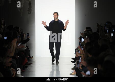 NEW YORK, NY - FEBRUARY 10: Designer Jonathan Simkhai greets the audience after presenting his collection at Jonathan Simkhai Show during New York Fas Stock Photo