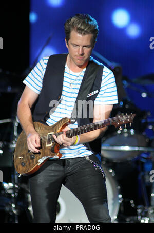 Joe Don Rooney with Rascal Flatts performs in concert at the Cruzan Amphitheatre in West Palm Beach, Florida on September 13, 2014 Stock Photo