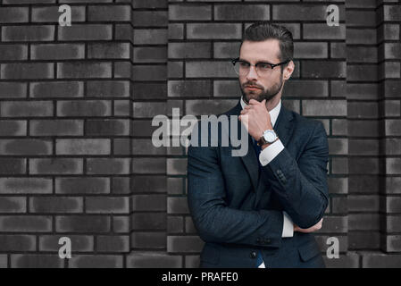 A young businessman thought about the future prospects Stock Photo