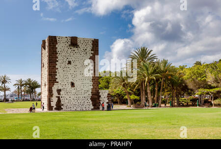 LA GOMERA, SPAIN - AUGUST 18: (EDITORS NOTE: A polarizing filter was used for this image.) People walk around the Torre del Conde (The Count’s Tower) in San Sebastián de la Gomera on August 18, 2018 in La Gomera, Spain. This building is the oldest military fort in the Canaries. Stock Photo